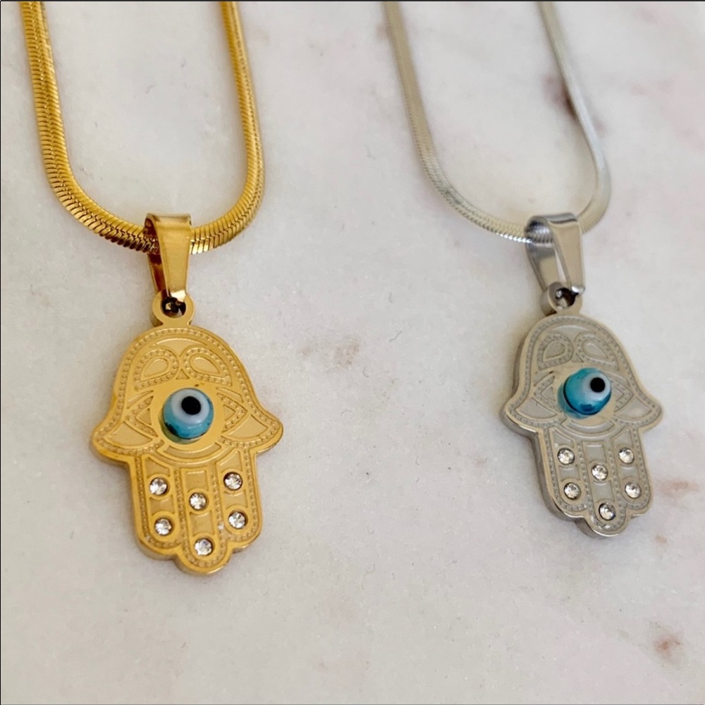 2 gold and 2 silver Hamsa Hand necklaces